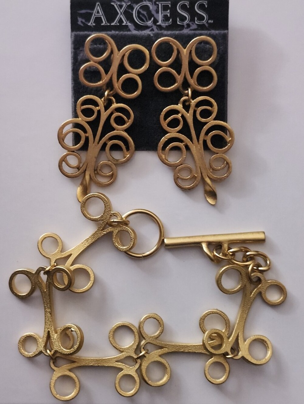 NWT Axcess Gold Tone.swirl Drop Earrings and Bracelet Set